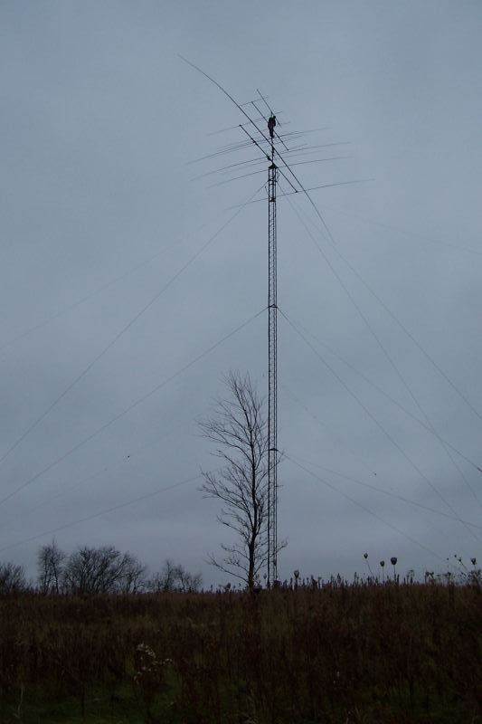 Tower climber Chuck walking up the mast to do some antenna maintenance. Very glad that WØAIH thought to create and in