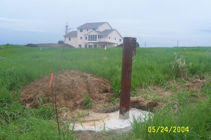 One of the three elevated guy posts, just after cement was poured.