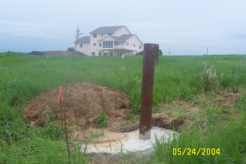 One of the three elevated guy posts, just after cement was poured.