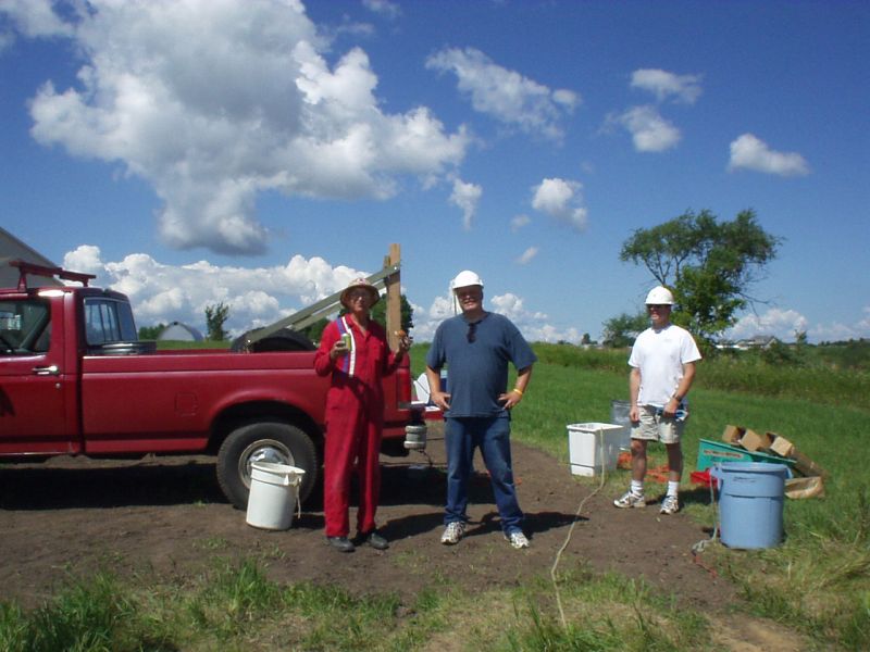 W0AIH (left) takes a much needed food and beverage break during the tower install.
