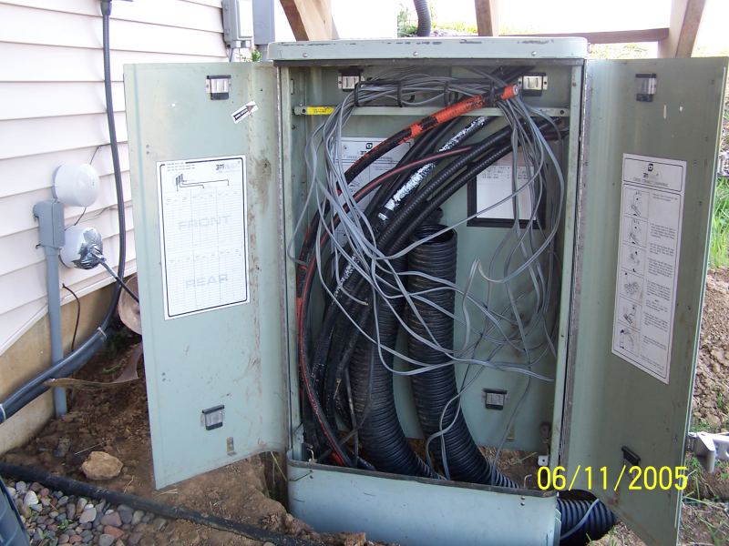 Cut the hardline & drain tile just so it fit.  Still have to install connectors, lightning protection, etc.