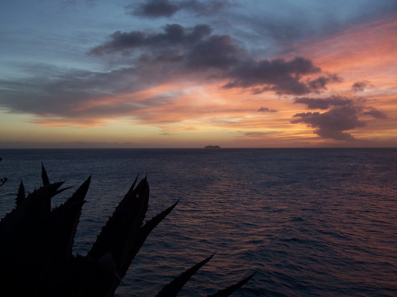 Cruise ship in distance, at sunset