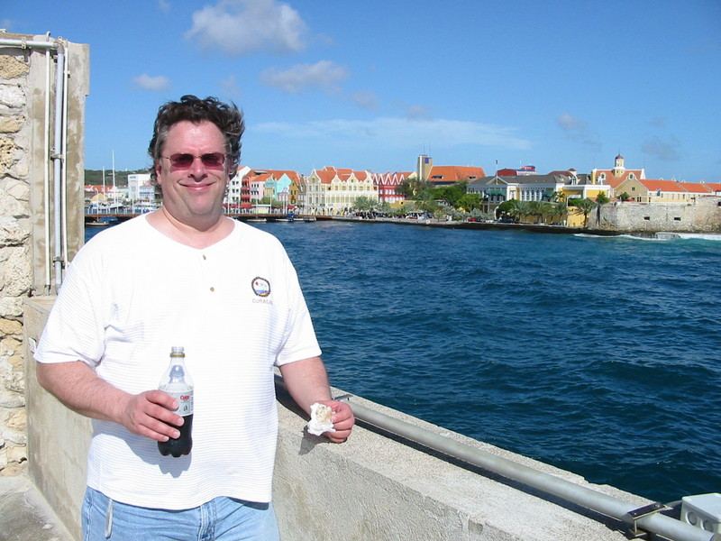 Mike K9NW, enjoys a Coke Light and a very delicious locally-made coconut candy.