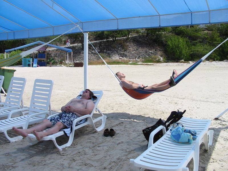 Mike and Chad taking a snooze, at the Sunset Waters Beach Resort.