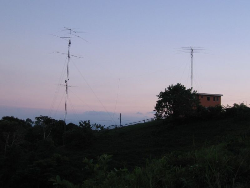 NP4Z QTH, looking South. Tower on right is 85ft with Bencher Skyhawk.  Tower on left is 130ft with Force 12 antennas for 40, 15 