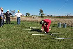(L-R) Bill KE9XQ, Jerome WA9HCZ, Mark N9UNW and Eric KB9TKF watch as Paul W&Oslash;AIH attaches rope to Cushcraft 6 element 