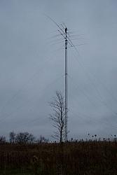 Tower climber Chuck walking up the mast to do some antenna maintenance. Very glad that WØAIH thought to create and in