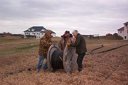 Ron N9OY, Mark N9UNW and Bill KE9XQ roll out some 3/4 inch CATV 75 ohm hardline (donated by local cable company)