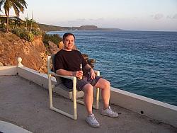 Scott KA9FOX enjoys an Amstel Bright while overlooking the ocean.