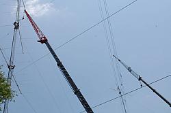 Don, K4ZA on the 10-stack removing the damaged 8 ele OWA at 105' while John, W2GD, readies the  7ele OWA  at 185...