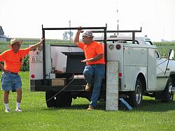 Jim Ward on the left and WB9Z on the
right discussing the "easy" installation
of the 40 meter yagi.  It sure helps t