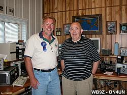 Two DXers who have at least 300 countries each on 160 meters.  
The guy on the right of course
world renown ON4UN 